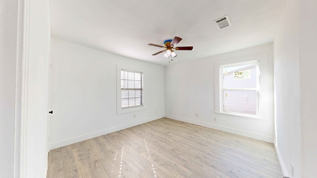 unfurnished room featuring ceiling fan and light hardwood / wood-style flooring