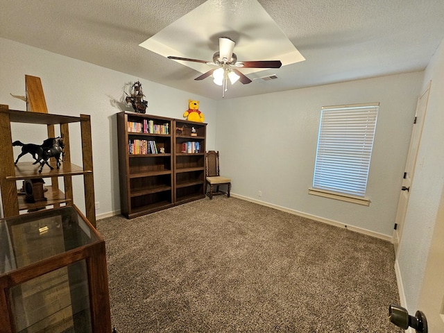 916-B Bronstad Dr, Andrews, TX 79714 - office featuring ceiling fan, carpet, and a textured ceiling
