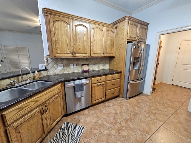 916-B Bronstad Dr, Andrews, TX 79714 - kitchen with appliances with stainless steel finishes, decorative backsplash, crown molding, light tile patterned floors, and dark stone countertops