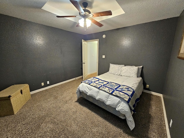 916-B Bronstad Dr, Andrews, TX 79714 - carpeted bedroom featuring ceiling fan and a textured wall