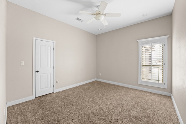 4306 S County Rd 1140, Midland, TX 79706 - carpeted spare room featuring a ceiling fan and baseboards