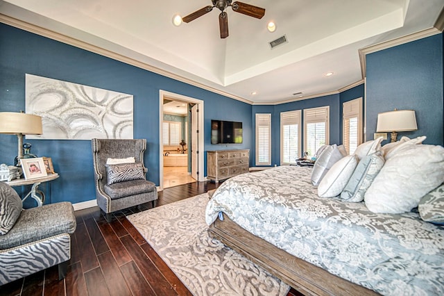 bedroom featuring ceiling fan, ensuite bathroom, ornamental molding, and dark wood-type flooring