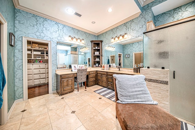 bathroom featuring vanity, tile patterned floors, an enclosed shower, and ornamental molding