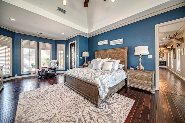 bedroom with ceiling fan, dark hardwood / wood-style flooring, and ornamental molding