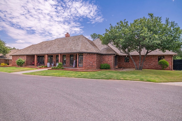 view of front of home with a front yard