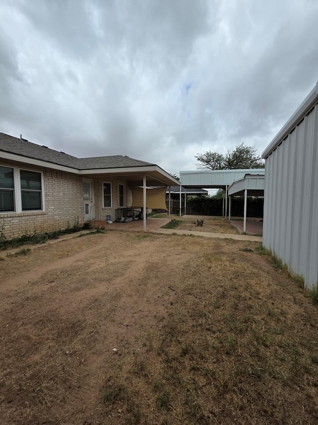 4732 Harvard Ave, Midland, TX 79703 - view of yard with a detached carport