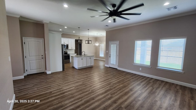 1104 Osprey Dr, Midland, TX 79706 - unfurnished living room with a sink, visible vents, dark wood-style flooring, baseboards, and recessed lighting