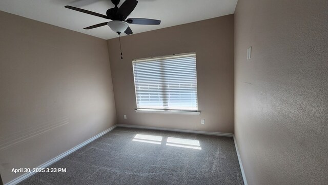 1104 Osprey Dr, Midland, TX 79706 - spare room featuring carpet flooring, baseboards, and a ceiling fan