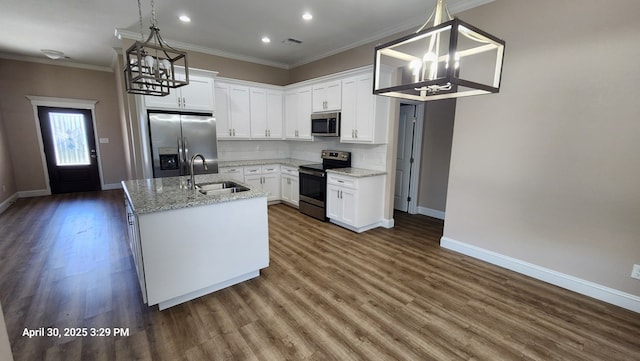 1104 Osprey Dr, Midland, TX 79706 - kitchen featuring a sink, stainless steel appliances, baseboards, a chandelier, and dark wood-style floors