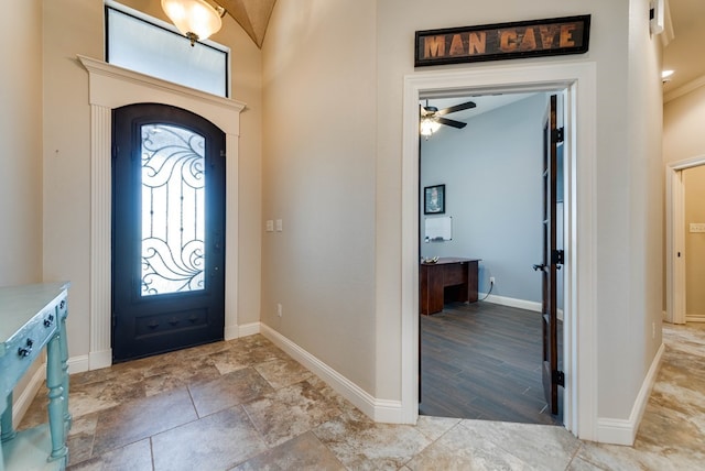 entryway with light hardwood / wood-style floors, plenty of natural light, lofted ceiling, and ceiling fan