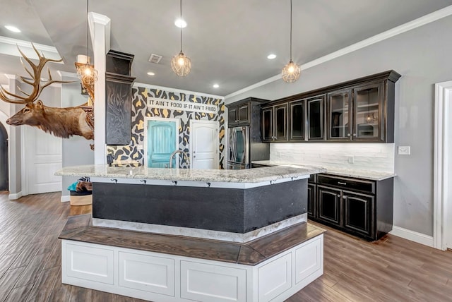 kitchen featuring decorative backsplash, smart refrigerator, and crown molding