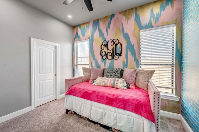 carpeted bedroom with baseboards, a ceiling fan, and wallpapered walls