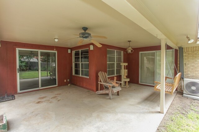 view of patio with ac unit and ceiling fan