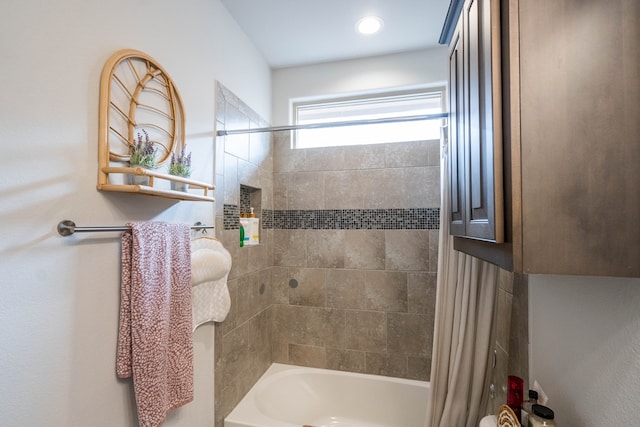 full bathroom with shower / tub combo with curtain