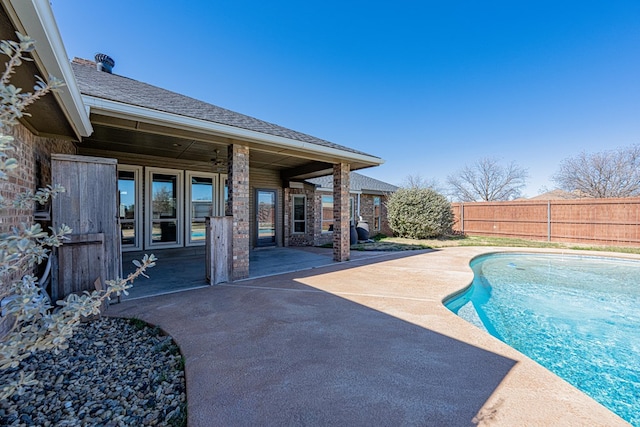 view of pool featuring a patio