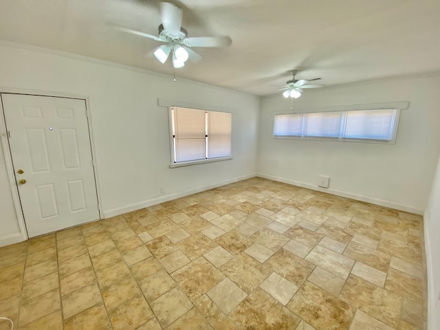 spare room with ceiling fan