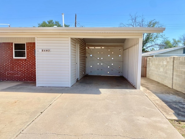 2107 Alabama St, Big Spring, TX 79720 - garage with fence and driveway