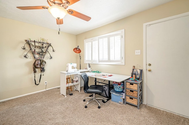 office with light colored carpet and ceiling fan