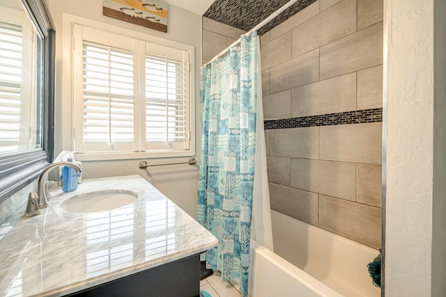 bathroom with shower / bath combination with curtain and vanity