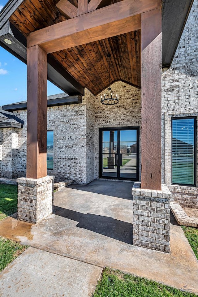 property entrance featuring french doors