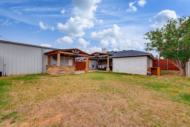 3906 Lehigh Dr, Midland, TX 79707 - back of property featuring a chimney and an outdoor structure