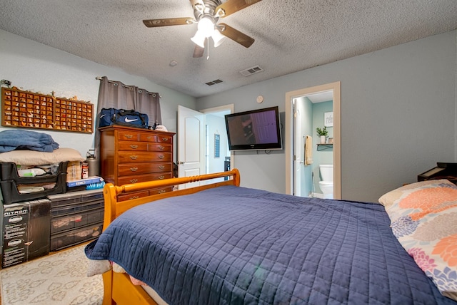 3906 Lehigh Dr, Midland, TX 79707 - bedroom featuring a textured ceiling, a ceiling fan, and ensuite bathroom