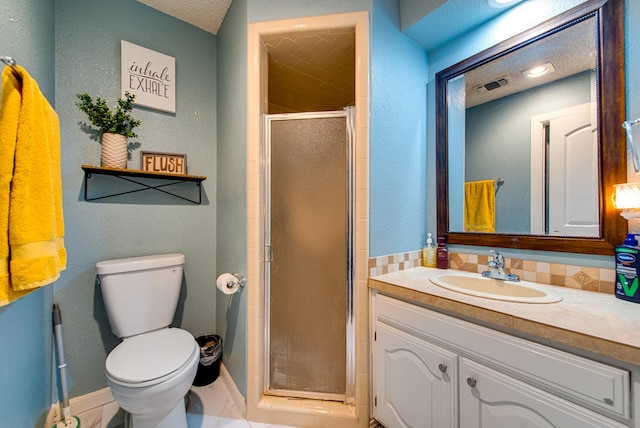 3906 Lehigh Dr, Midland, TX 79707 - bathroom featuring vanity, a shower stall, toilet, a textured wall, and baseboards