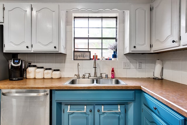 3906 Lehigh Dr, Midland, TX 79707 - kitchen with dishwasher, blue cabinetry, a sink, and white cabinets