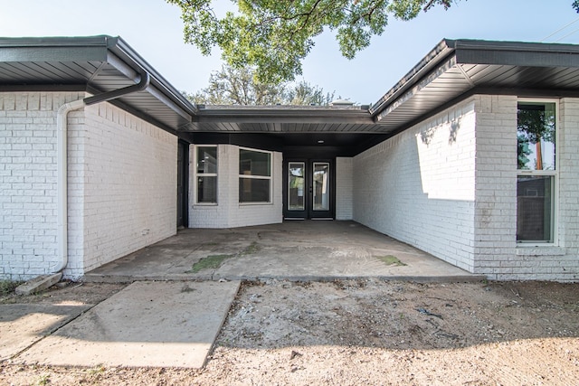 exterior space with a carport