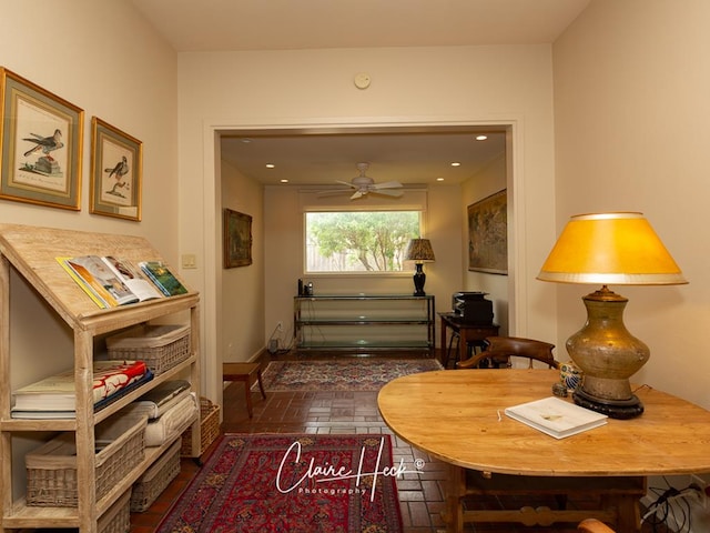 interior space featuring ceiling fan