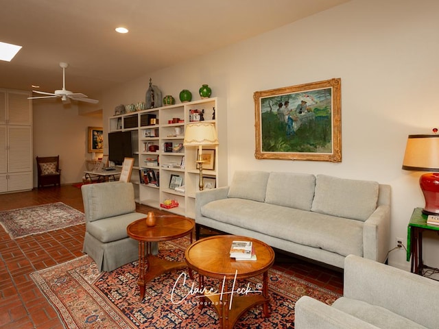 living room featuring ceiling fan