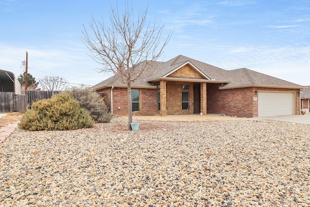 ranch-style home with a garage