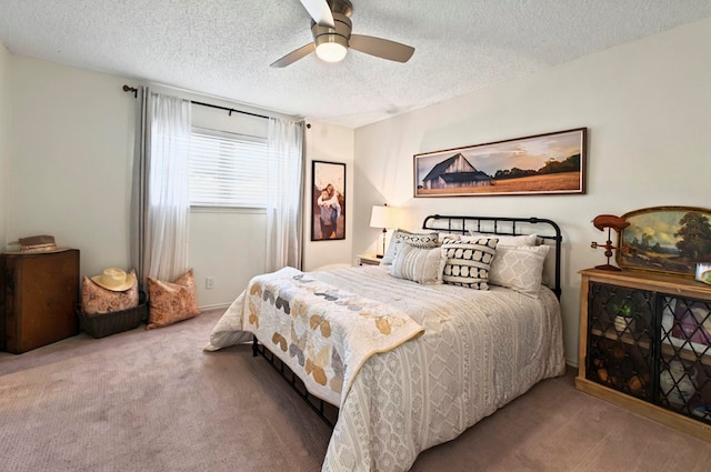 2401 Metz Pl, Midland, TX 79705 - bedroom featuring carpet flooring, a textured ceiling, and ceiling fan