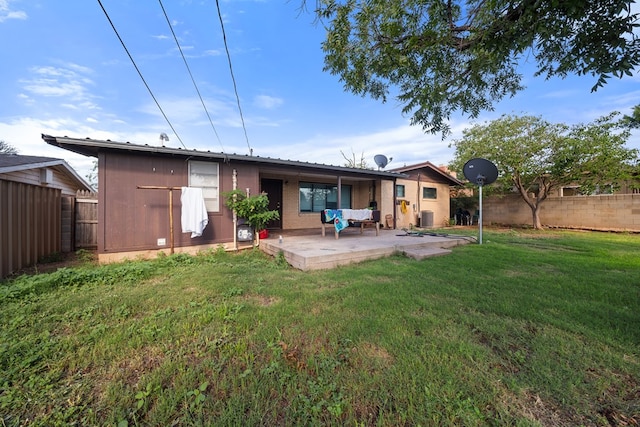 704 Birdwell Ln, Big Spring, TX 79720 - back of house featuring a patio