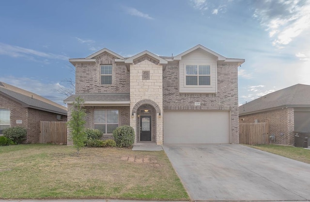 1215 Santa Clara, Midland, TX 79705 - traditional-style home featuring an attached garage, driveway, brick siding, and stone siding