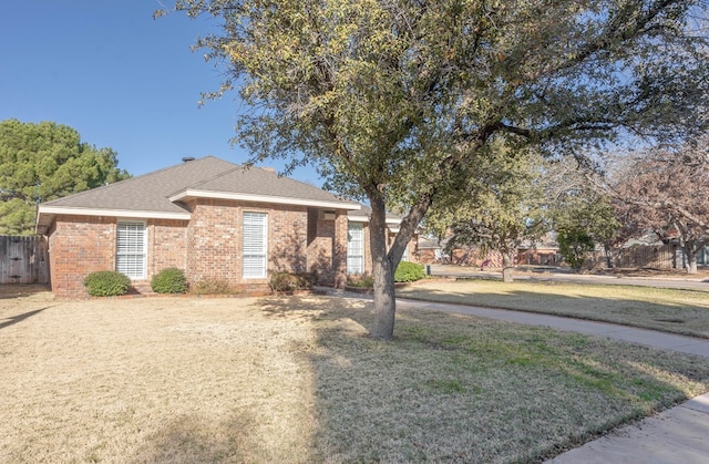 view of front of home with a front yard