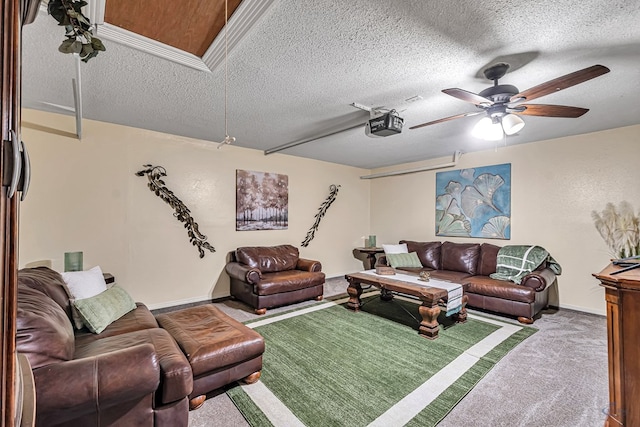 3409 Wedgwood, Midland, TX 79707 - living room featuring baseboards, carpet flooring, a textured ceiling, and a ceiling fan