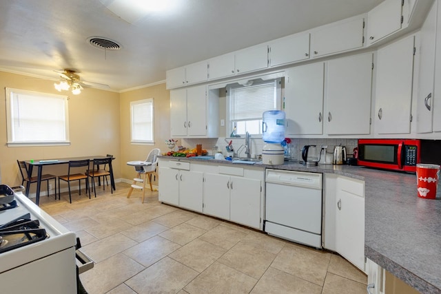 1603 Sycamore St, Big Spring, TX 79720 - kitchen featuring white appliances, crown molding, backsplash, light tile patterned flooring, and white cabinetry
