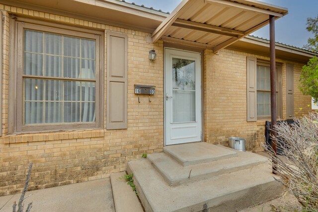 1603 Sycamore St, Big Spring, TX 79720 - view of exterior entry with brick siding