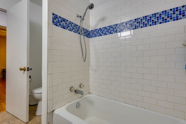 1603 Sycamore St, Big Spring, TX 79720 - full bathroom with toilet,  shower combination, and tile patterned floors