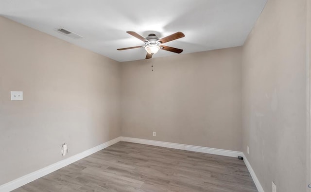 unfurnished room featuring ceiling fan and light hardwood / wood-style floors