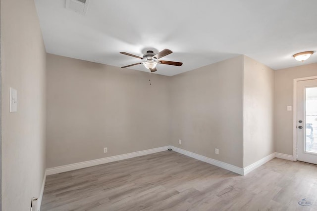 unfurnished room featuring ceiling fan and light wood-type flooring