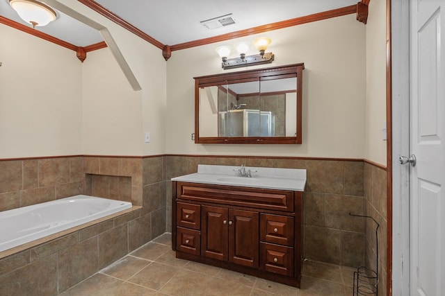 15103 E County Rd 106, Midland, TX 79706 - bathroom with tile walls, vanity, crown molding, a garden tub, and a wainscoted wall