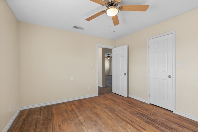 15103 E County Rd 106, Midland, TX 79706 - unfurnished bedroom with wood finished floors and a ceiling fan