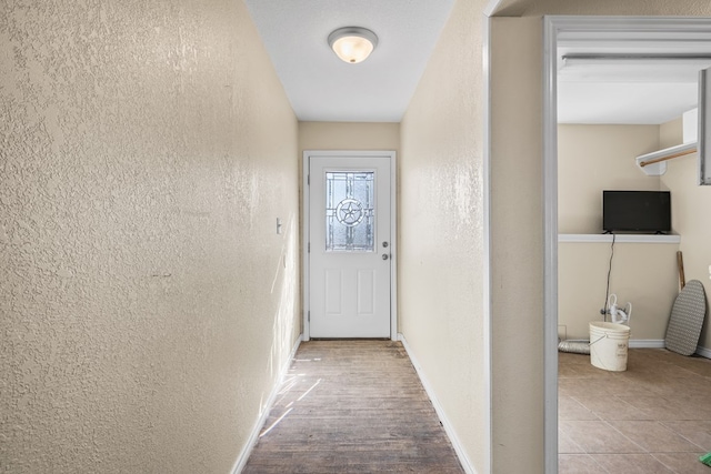 15103 E County Rd 106, Midland, TX 79706 - entryway with a textured wall and baseboards