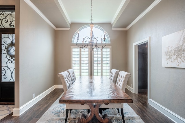 4508 Island Dr, Midland, TX 79707 - dining space with a chandelier, dark wood-style flooring, crown molding, and baseboards