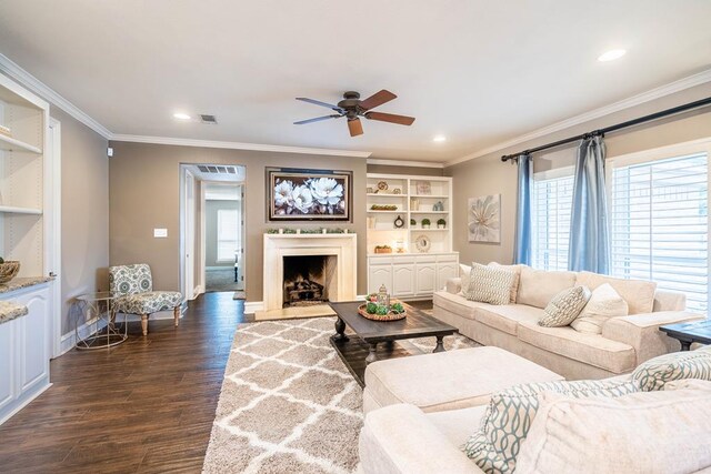 4508 Island Dr, Midland, TX 79707 - living area featuring ceiling fan, crown molding, healthy amount of natural light, dark wood-type flooring, and baseboards