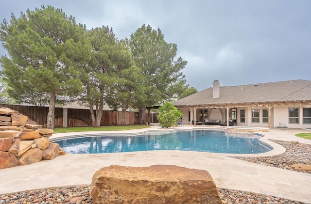 4508 Island Dr, Midland, TX 79707 - view of swimming pool with a fenced backyard and a patio