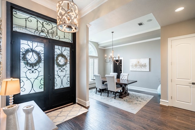 4508 Island Dr, Midland, TX 79707 - entrance foyer featuring french doors, a chandelier, ornamental molding, and baseboards