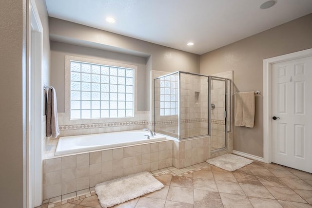 4508 Island Dr, Midland, TX 79707 - bathroom with a bath, a stall shower, tile patterned floors, and recessed lighting